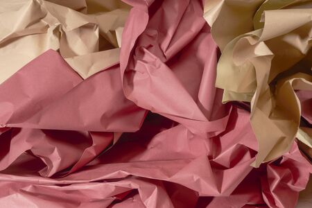 full frame red and brown crumpled paper backgroundの写真素材
