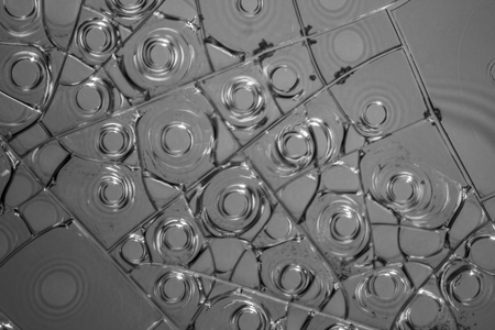 microscopic detail of some dried egg white in grey backの写真素材