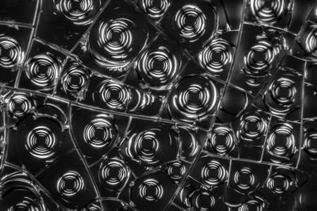 microscopic detail of some dried egg white in dark back