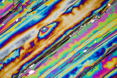 microscopic shot of urea micro crystals in polarized lightの写真素材