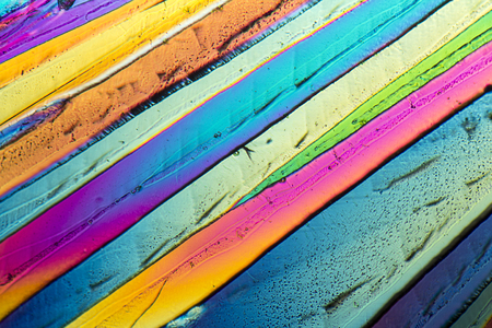 colorful microscopic shot of Sucrose micro crystals in polarized lightの写真素材