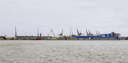 industrial harbor scenery seen in Rotterdam, a city in the Netherlandsの写真素材