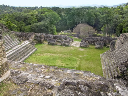 high angle shot showing the ancient Maya archaeological site named Caracol located in Belize in Central Americaの写真素材