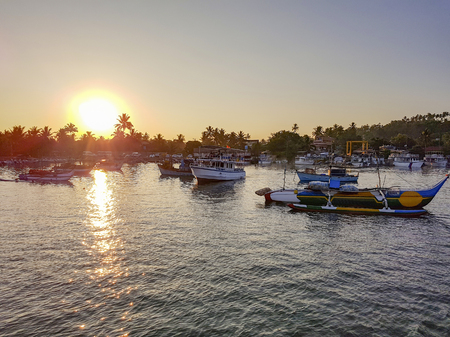 some traditional boats seen in Sri Lanka at evening timeの写真素材