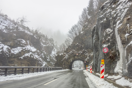 Passage at a rock formation seen in the Berchtesgadener Land in Bavaria, Germany, at winter timeの写真素材