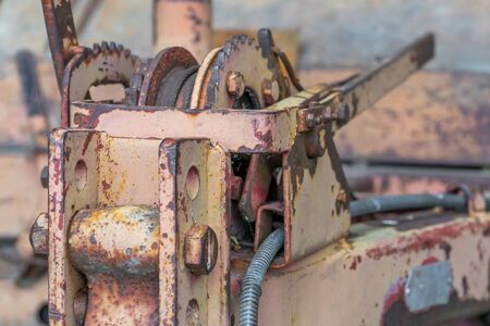 closeup shot of a weathered rusty machinery detail