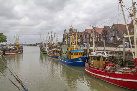 Fishing village named Neuharlingersiel located in East Frisia, Germany