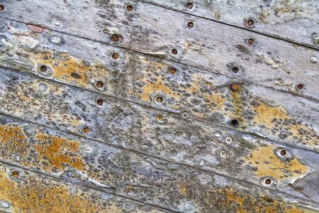 full frame weathered wooden planks backgroundの写真素材