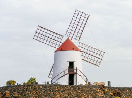 white windmill at Lanzarote, an island of the Canary Islands in the Atlantic Oceanの写真素材