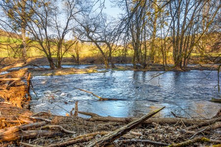 Sunny evening scenery around river Jagst in Hohenlohe, a district in Southern Germanyの写真素材