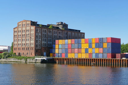 Freight scenery including lots of containers at a historic oil mill in Luebeck-Siemsのeditorial素材