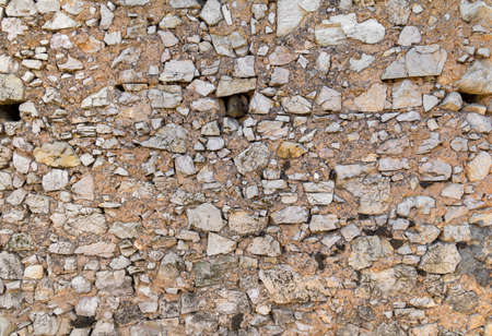 Full frame closeup shot of a historic stone wallの写真素材
