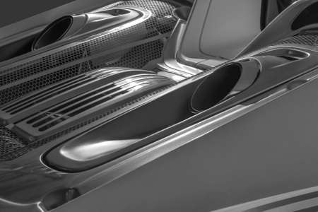 Detail shot of a sports car with mid-engine design