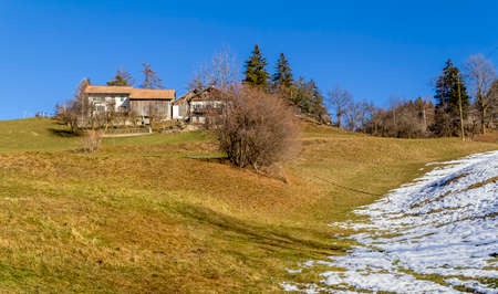 Rural alpine scenery around a village named St Felix in South Tyrol at winter timeの写真素材