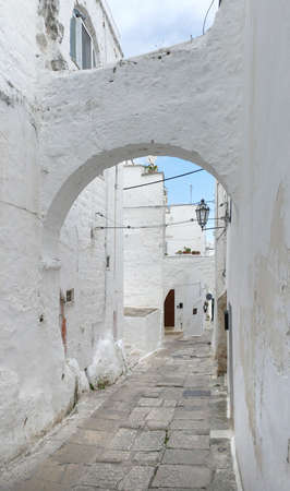 Alleyway in Ostuni, a city in Apulia, Italyの写真素材