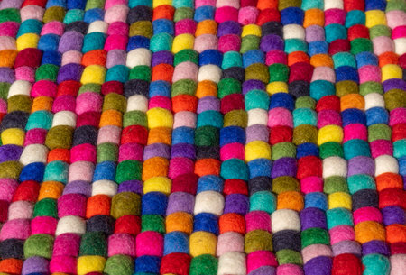 Lots of colorful felt balls side by sideの写真素材