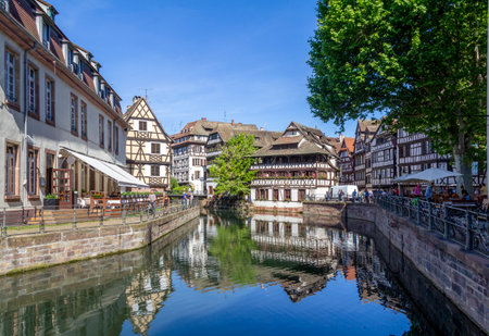 Idyllic waterside impression of Strasbourg, a city at the Alsace region in France