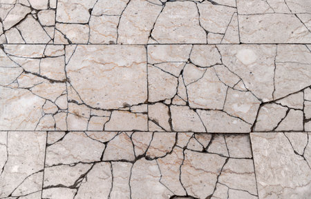 Full frame detail showing lots of broken floor tiles seen from aboveの写真素材