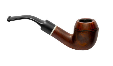 Tobacco pipe made of briar wood and ebonite stem isolated in white back