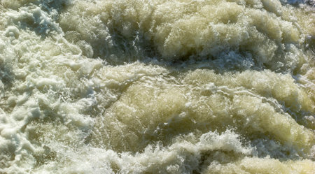 Full frame high angle shot of wild water in sunny ambiance