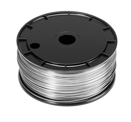 Coil of metal wire isolated in white backの写真素材