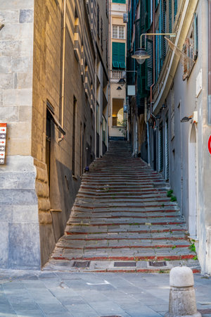 Alleyway with stairs in Genoa, the capital of the Italian region of Liguriaの写真素材