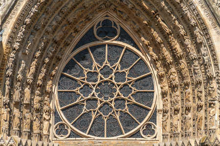 Central portal and rose window of the Reims Cathedral in Reims, the most populous city in the French...