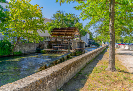 Impression of L'Isle-sur-la-Sorgue, a town and commune on the Sorgue river in Southeastern France.の写真素材