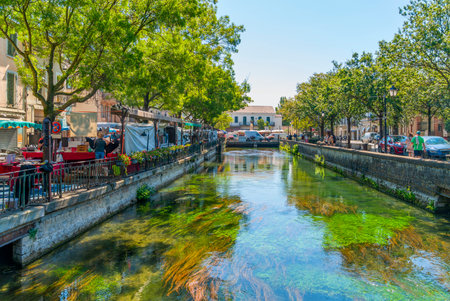 Impression of L'Isle-sur-la-Sorgue, a town and commune on the Sorgue river in Southeastern France.の写真素材