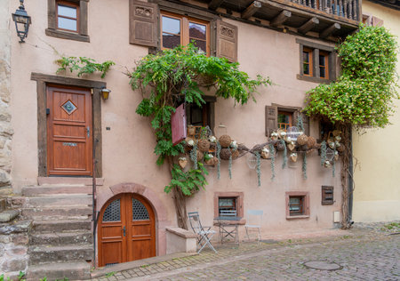 Historic house facade seen in Turckheim, commune in the Haut-Rhin department in Grand Est in north-eastern Franceの写真素材
