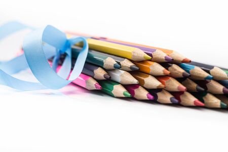Pencils wrapped in a ribbonの写真素材