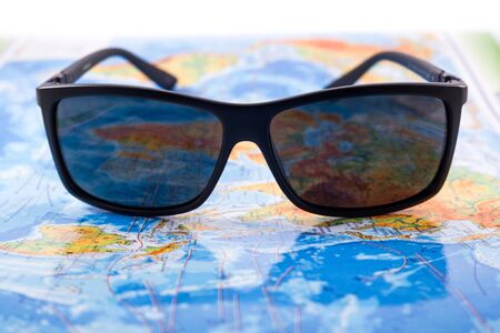 Sunglasses and mapの写真素材