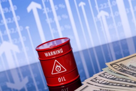 barrel oil and dollars on the blue chartの写真素材