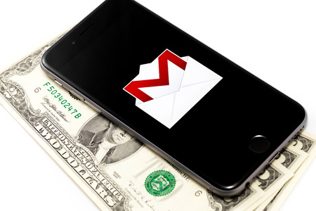 Black Apple iPhone 6s with Google Gmail logo. Gmail is a free e-mail service provided by Google. Isolated on white background. Chelyabinsk, Russia - March 03, 2016.のeditorial素材