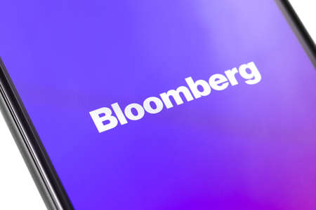 Bloomberg logo on the screen smartphone. Bloomberg L.P. is a privately held financial software, data and media company. Moscow, Russia - March 1, 2019のeditorial素材