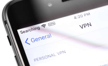Macro closeup Apple iPhone with VPN Settings on the screen. Moscow, Russia - March 17, 2019のeditorial素材