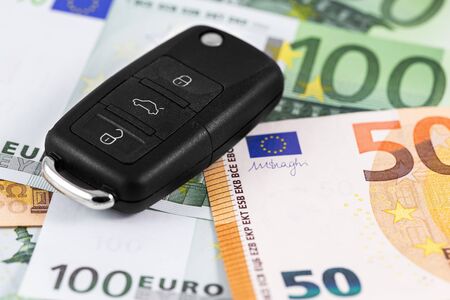 closeup euro money with car keyの写真素材