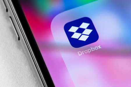 closeup smartphone with Dropbox logo on the screen. Dropbox is file hosting company Dropbox Inc. Moscow, Russia - June 28, 2019のeditorial素材