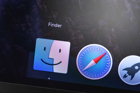 Apple Macbook with Finder app icon on the screen. Finder is a macOS system file manager. Moscow,...