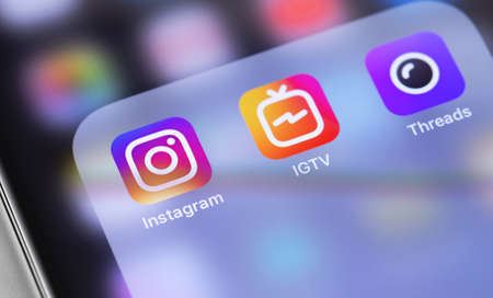 Instagram with services IGTV and Threads icons app on the screen smartphone closeup. Instagram is a photo-sharing app for smartphones. Moscow, Russia - September 26, 2019のeditorial素材