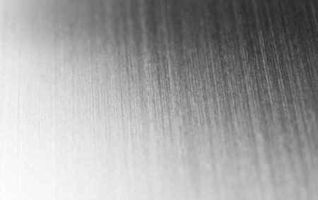 macro smooth metal lines steel texture backgroundの写真素材