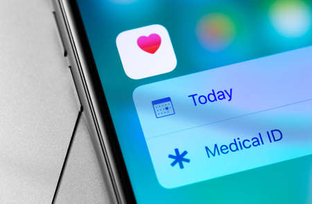 Apple iPhone with Health app on the screen closeup. Apple Inc. is an American multinational...