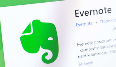 Evernote logo app on the screen notebook. Evernote is a web service and software suite for creating...