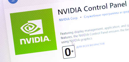 Nvidia logo app on the screen notebook closeup. Nvidia is an American technology company that...