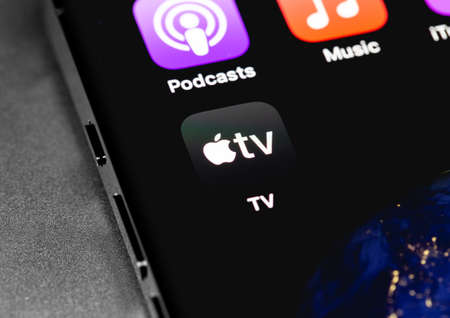 Apple TV icon app on the screen iPhone. Apple is a multinational technology company. Moscow, Russia - November 28, 2020のeditorial素材