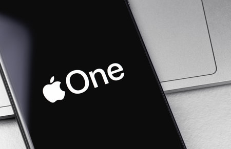 Apple One logo on the screen iPhone. Apple One is a subscription service together for one price. Moscow, Russia - September 24, 2020のeditorial素材