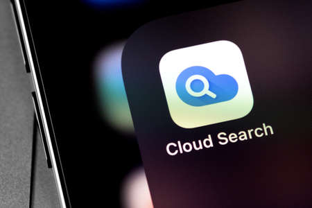 Google Cloud Search app on the screen smartphone. Google Cloud Search is an artificial intelligence-powered assistant that helps users find the information they need quickly. Moscow, Russia - December 5, 2020のeditorial素材