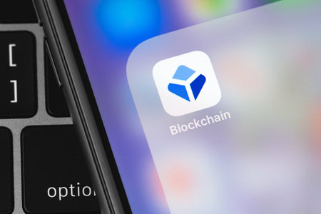 Blockchain mobile app on the screen smartphone. Blockchain.com is the most popular place to securely buy, store, and trade cryptocurrencies. Moscow, Russia - July 28, 2020のeditorial素材