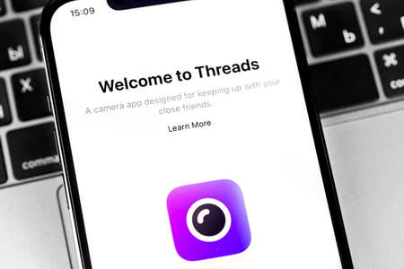 Instagram Threads app on the display iPhone closeup. Instagram Threads is messenger for messaging, photo and video. Moscow, Russia - December 5, 2020のeditorial素材