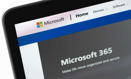 Microsoft website on the screen notebook closeup. Microsoft is one of the largest multinational...